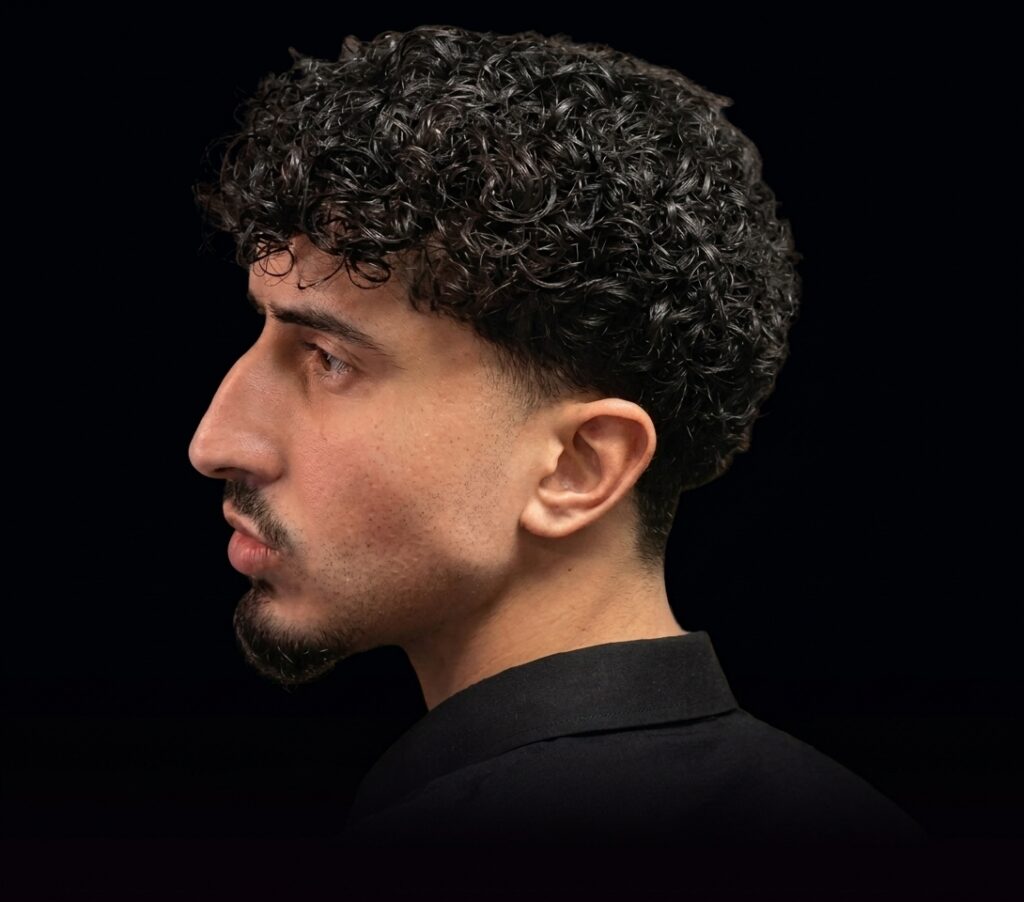 Side profile picture of Ayman Zagaghi